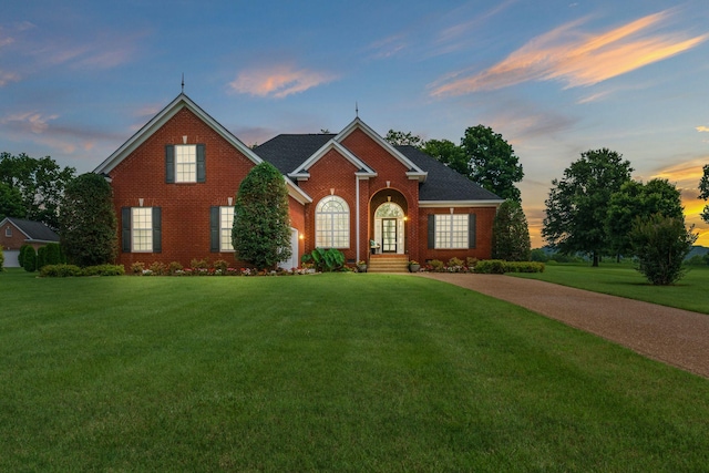 1032 Harness Cir, Gallatin, TN 37066 - traditional-style home featuring brick siding and a front lawn
