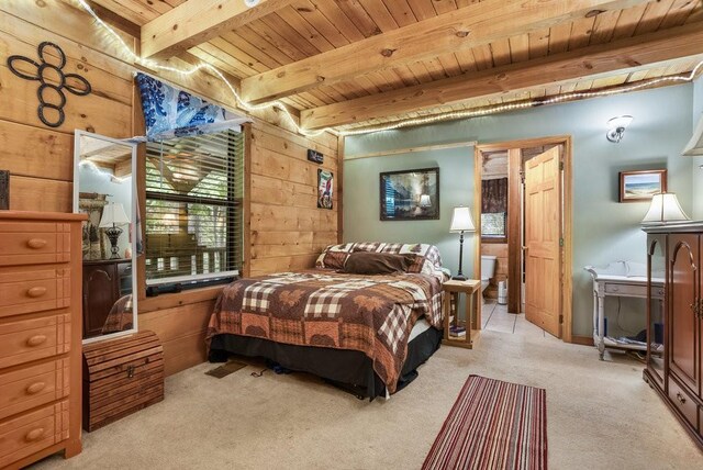 2875 Stage Coach Rd, Sewanee, TN 37375 - bedroom featuring a wooden ceiling with exposed beams, wooden walls, and light carpet
