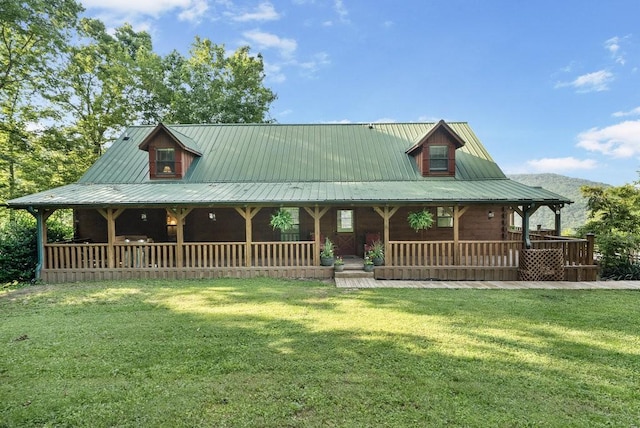 2875 Stage Coach Rd, Sewanee, TN 37375 - view of front of house featuring a porch, a front yard, and a metal roof