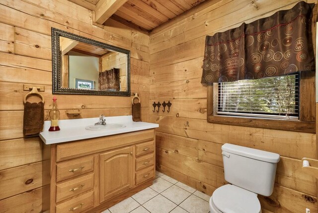 2875 Stage Coach Rd, Sewanee, TN 37375 - bathroom featuring a wood ceiling with exposed beams, wood walls, vanity, and tile patterned floors
