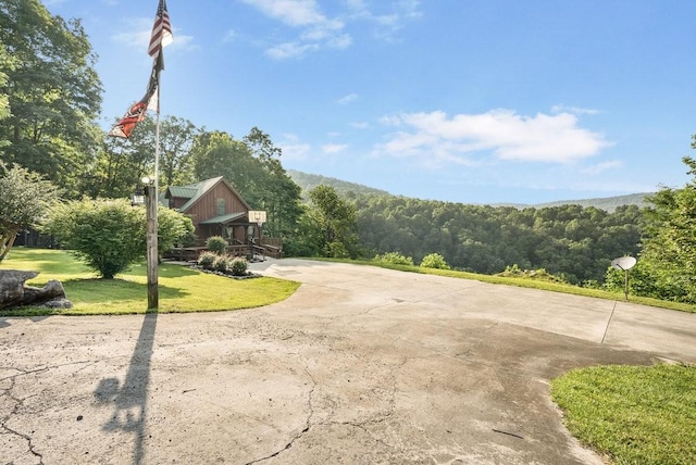 2875 Stage Coach Rd, Sewanee, TN 37375 - view of home's community featuring a lawn and a view of trees