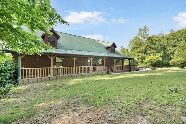 2875 Stage Coach Rd, Sewanee, TN 37375 - view of front facade featuring a front yard, a metal roof, and covered porch