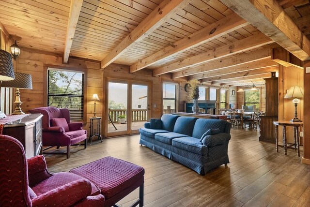 2875 Stage Coach Rd, Sewanee, TN 37375 - living area with a wood ceiling with exposed beams, wood walls, and hardwood / wood-style flooring