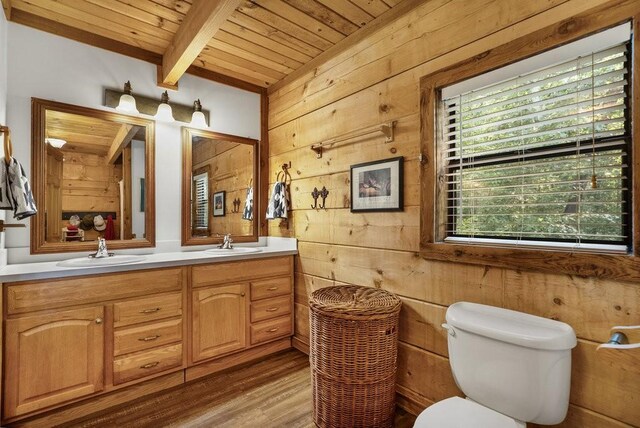 2875 Stage Coach Rd, Sewanee, TN 37375 - bathroom featuring a wooden ceiling with exposed beams, double vanity, wood walls, and wood finished floors