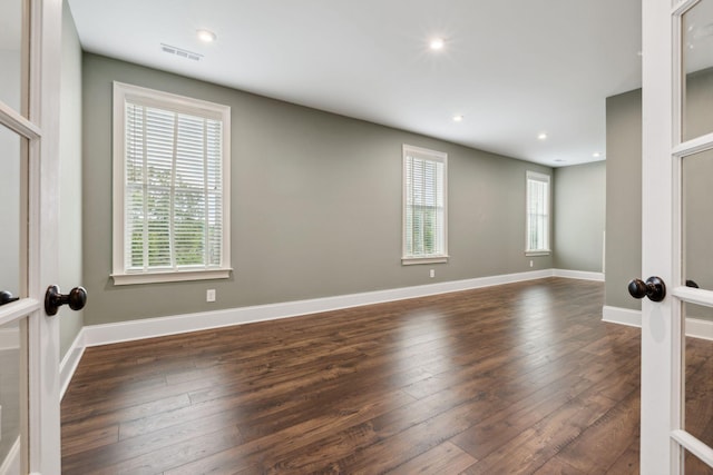 6013 Blackwell Ln, Franklin, TN 37064 - spare room featuring dark wood-style flooring and recessed lighting
