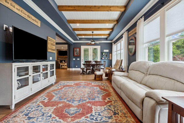 6013 Blackwell Ln, Franklin, TN 37064 - living room with beamed ceiling, wood finished floors, a ceiling fan, and plenty of natural light
