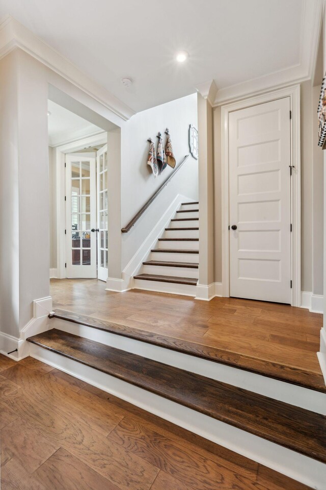 6013 Blackwell Ln, Franklin, TN 37064 - entryway with french doors, stairs, wood finished floors, and recessed lighting