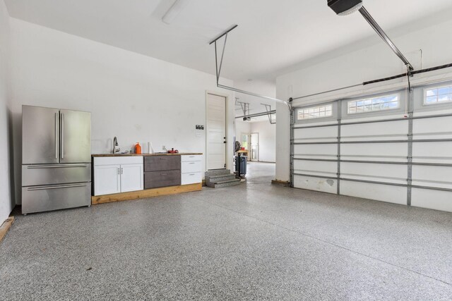 6013 Blackwell Ln, Franklin, TN 37064 - garage featuring high quality fridge and a garage door opener