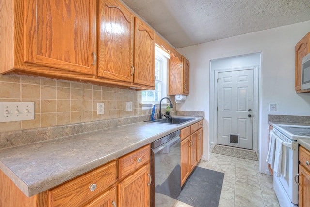 168 N Wagon Trl, Murfreesboro, TN 37128 - kitchen with appliances with stainless steel finishes, backsplash, brown cabinets, light countertops, and a textured ceiling