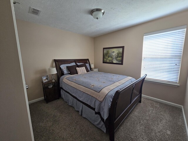1736 Bellamy Ln, Murfreesboro, TN 37128 - bedroom featuring a textured ceiling and carpet