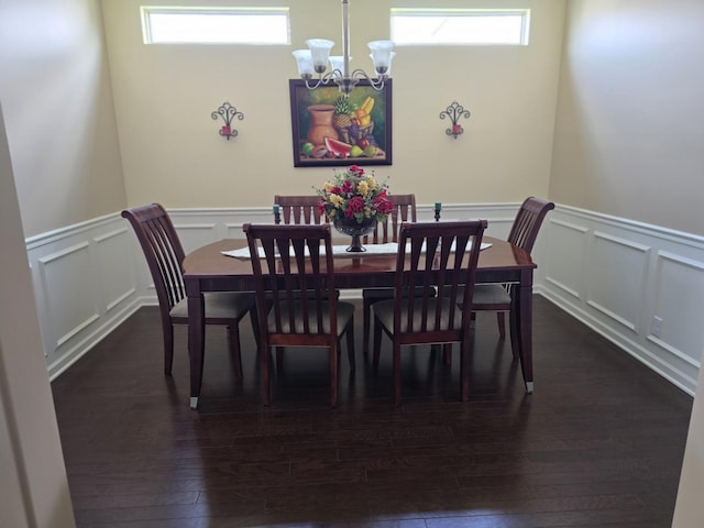 1736 Bellamy Ln, Murfreesboro, TN 37128 - dining room featuring a decorative wall, a chandelier, wainscoting, and dark wood-type flooring