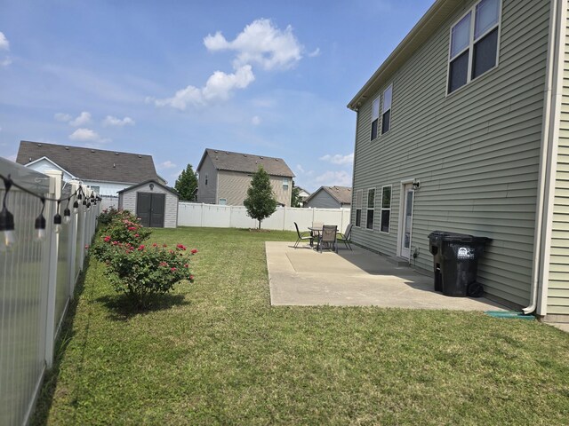1736 Bellamy Ln, Murfreesboro, TN 37128 - fenced backyard featuring a storage unit, a patio, and a residential view