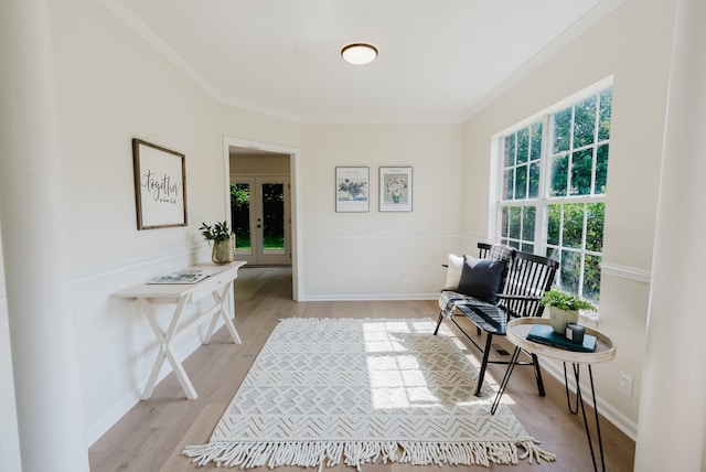 100 Crestfield Pl, Franklin, TN 37069 - living area with light wood-style floors and ornamental molding