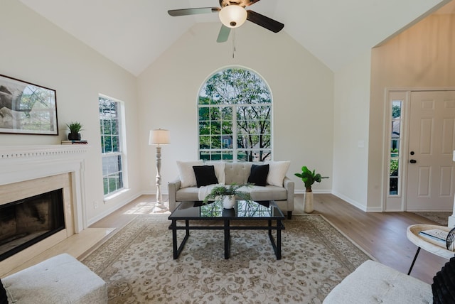 100 Crestfield Pl, Franklin, TN 37069 - living room with wood finished floors, a premium fireplace, ceiling fan, and high vaulted ceiling