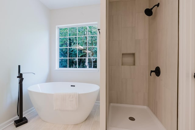 100 Crestfield Pl, Franklin, TN 37069 - bathroom with tiled shower and a freestanding tub