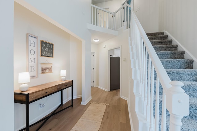 100 Crestfield Pl, Franklin, TN 37069 - staircase with wood finished floors and a towering ceiling