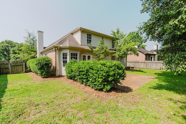 100 Crestfield Pl, Franklin, TN 37069 - rear view of house with a chimney and a fenced backyard