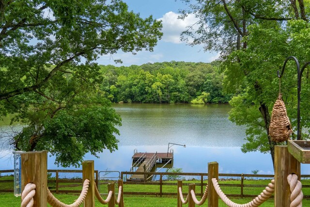 554 Hickman Shores Rd, Dover, TN 37058 - water view with a floating dock and a heavily wooded area