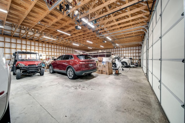 554 Hickman Shores Rd, Dover, TN 37058 - garage featuring a garage door opener