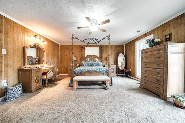 554 Hickman Shores Rd, Dover, TN 37058 - bedroom featuring wooden walls, carpet floors, a textured ceiling, ornamental molding, and a ceiling fan