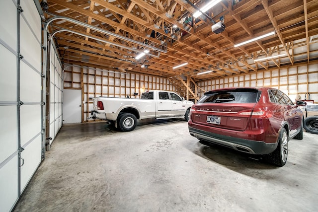 554 Hickman Shores Rd, Dover, TN 37058 - garage featuring a garage door opener