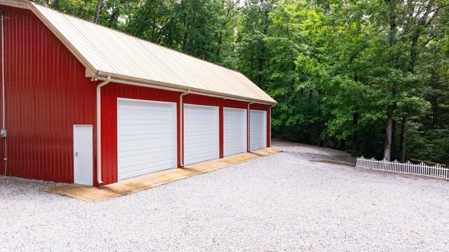 554 Hickman Shores Rd, Dover, TN 37058 - detached garage featuring a forest view