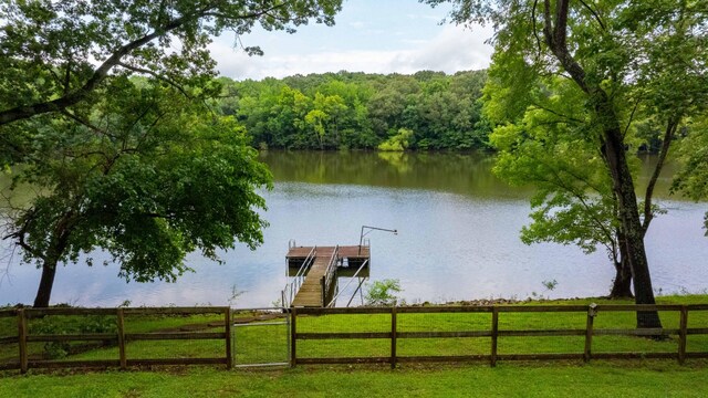 554 Hickman Shores Rd, Dover, TN 37058 - water view with a floating dock and a heavily wooded area