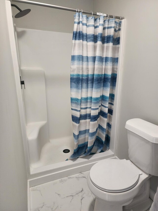 200 Church St, Loretto, TN 38469 - full bathroom featuring marble finish floors and a shower with shower curtain