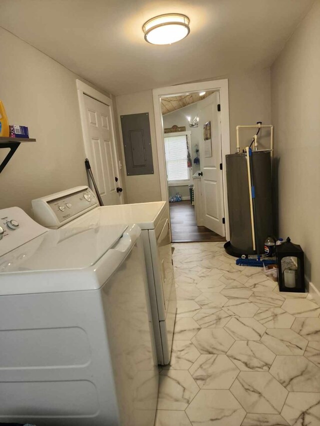 200 Church St, Loretto, TN 38469 - washroom featuring washing machine and dryer, electric panel, light marble finish floors, and water heater