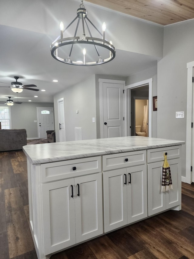 200 Church St, Loretto, TN 38469 - kitchen with white cabinetry, recessed lighting, dark wood-style flooring, ceiling fan, and decorative light fixtures