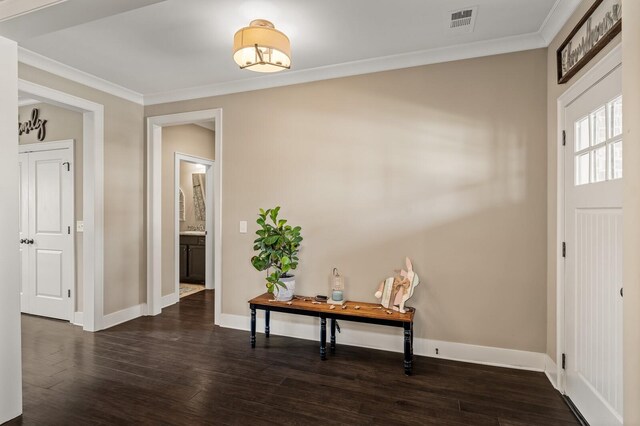 318 Finnhorse Ln, Franklin, TN 37064 - foyer entrance with dark wood-style flooring and ornamental molding