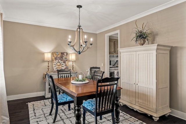 318 Finnhorse Ln, Franklin, TN 37064 - dining area featuring a chandelier, dark wood-style floors, and ornamental molding