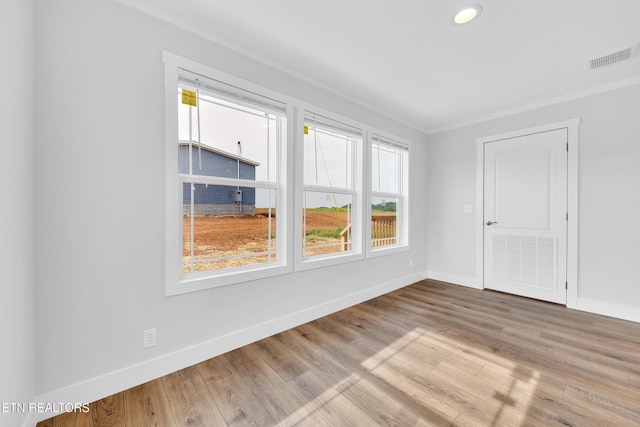 1559 River Path, Morristown, TN 37813 - empty room with wood finished floors, crown molding, and recessed lighting