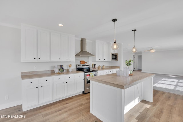 1559 River Path, Morristown, TN 37813 - kitchen featuring wall chimney range hood, appliances with stainless steel finishes, white cabinets, light countertops, and ceiling fan