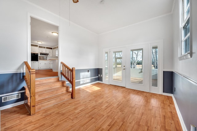 1077 Weeks Rd, Murfreesboro, TN 37127 - foyer with light wood-style floors, crown molding, french doors, and stairway