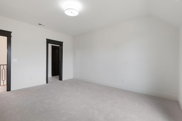 7312 Walker Rd, Fairview, TN 37062 - unfurnished bedroom with light carpet and lofted ceiling
