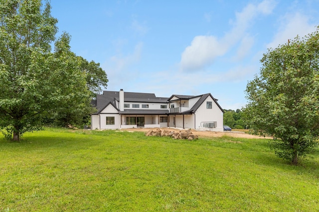 7312 Walker Rd, Fairview, TN 37062 - rear view of property with a lawn and a patio