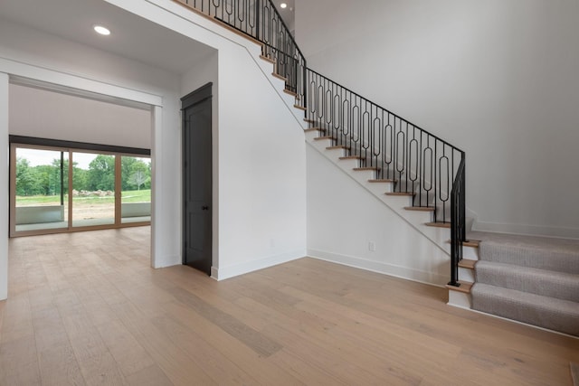 7312 Walker Rd, Fairview, TN 37062 - stairway featuring wood finished floors and recessed lighting