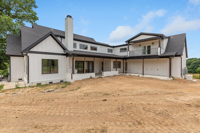 7312 Walker Rd, Fairview, TN 37062 - back of house featuring a balcony, crawl space, board and batten siding, a chimney, and roof with shingles