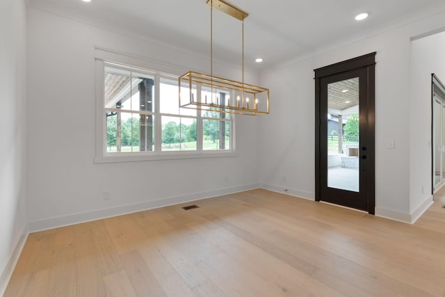 7312 Walker Rd, Fairview, TN 37062 - unfurnished dining area with a chandelier, wood finished floors, crown molding, and recessed lighting