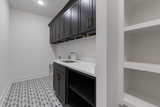 7312 Walker Rd, Fairview, TN 37062 - laundry area with cabinet space, light flooring, hookup for a washing machine, hookup for an electric dryer, and recessed lighting