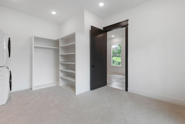 7312 Walker Rd, Fairview, TN 37062 - walk in closet featuring estacked washer and dryer and carpet floors
