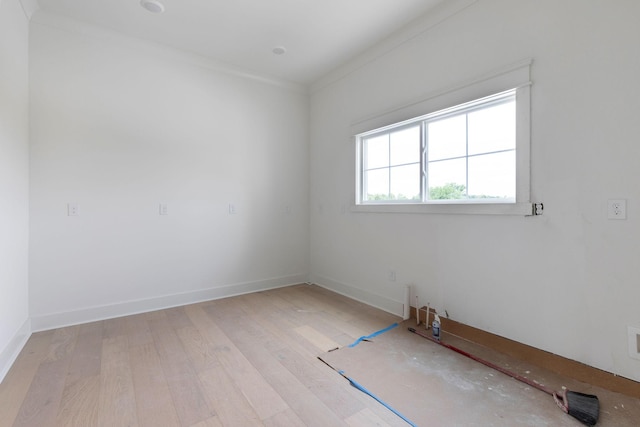 7312 Walker Rd, Fairview, TN 37062 - spare room featuring light wood-type flooring and ornamental molding