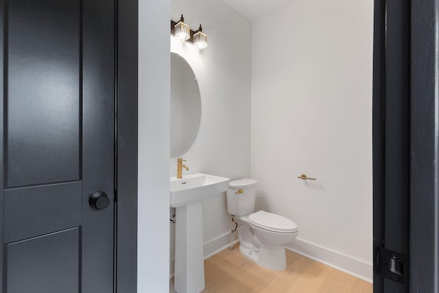 7312 Walker Rd, Fairview, TN 37062 - half bath featuring wood finished floors and baseboards