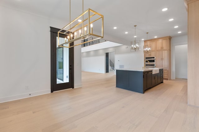 7312 Walker Rd, Fairview, TN 37062 - kitchen featuring a chandelier, light countertops, recessed lighting, light brown cabinets, and light wood-style flooring