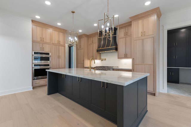 7312 Walker Rd, Fairview, TN 37062 - kitchen featuring a chandelier, light brown cabinetry, stainless steel double oven, light wood finished floors, and recessed lighting
