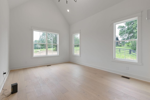 7312 Walker Rd, Fairview, TN 37062 - unfurnished room with light wood-style floors, high vaulted ceiling, and recessed lighting