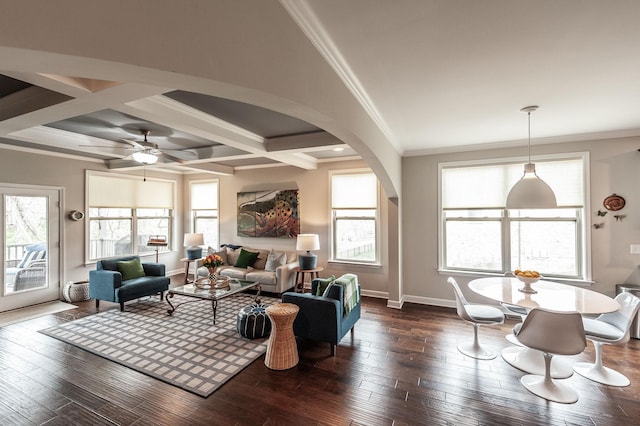 2044 Albatross Way, Gallatin, TN 37066 - living room featuring arched walkways, crown molding, dark wood-type flooring, coffered ceiling, and healthy amount of natural light