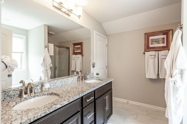 2044 Albatross Way, Gallatin, TN 37066 - bathroom featuring marble finish flooring, a stall shower, double vanity, and lofted ceiling