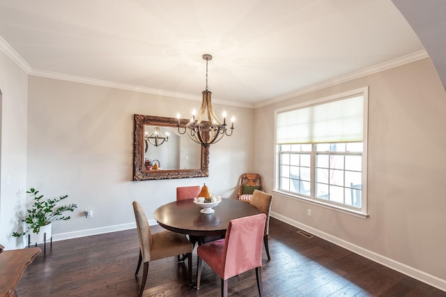 2044 Albatross Way, Gallatin, TN 37066 - dining space featuring a chandelier, dark wood-style floors, crown molding, and arched walkways